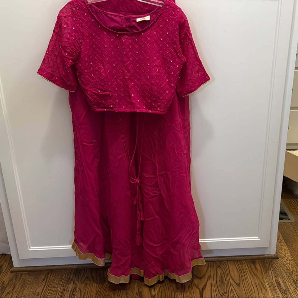 Traditional Pink Lehenga with Gold Accents and matching Dupata